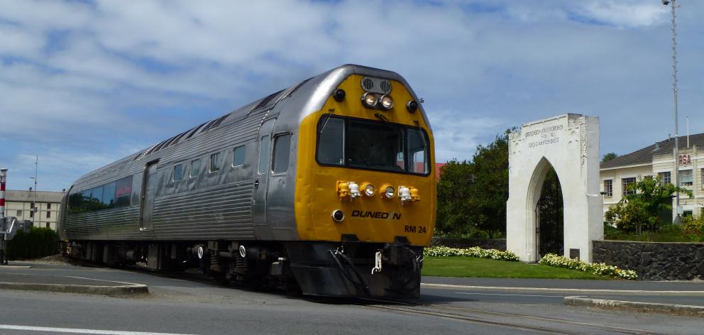 Dunedin Railways' Silver Fern Railcar, heading south past the Garden of Memories in Oamaru. PHOTO...
