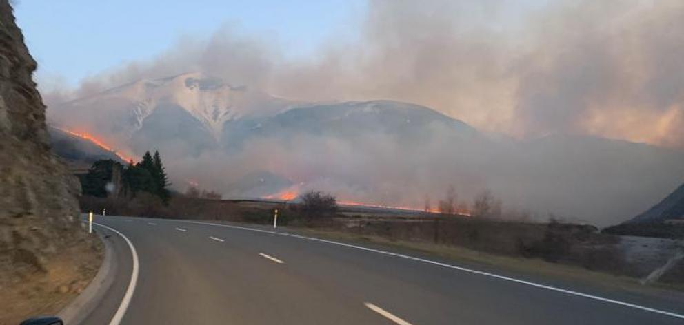 An image of the fire taken from inside a blocked off part of SH73. Photo: Supplied Darryl McCabe via RNZ