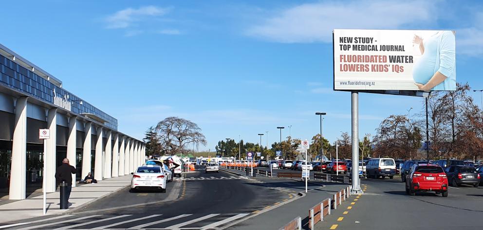 A Fluoride Free NZ billboard outside Dunedin Airport on Sunday, and being removed yesterday....