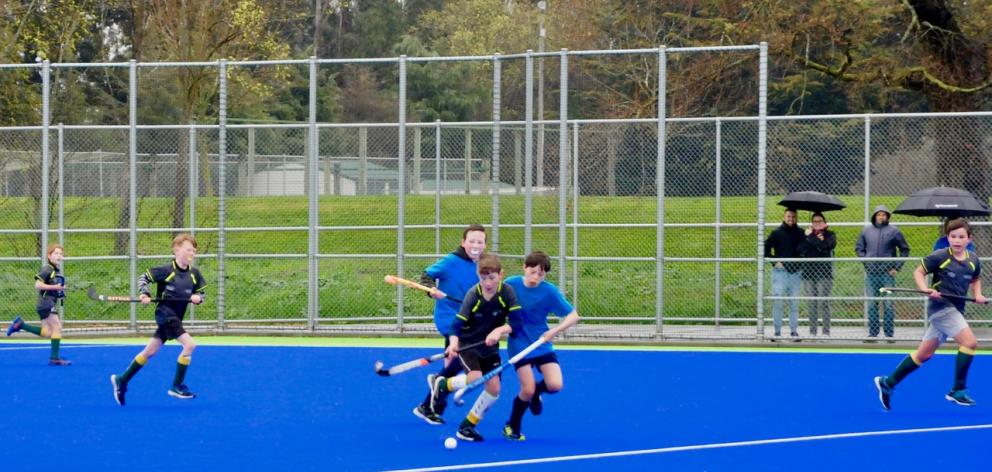 The Selwyn Grizzlies take on the North Canterbury Black Year 6/7 boys in the rain. Photo: Shelley Topp