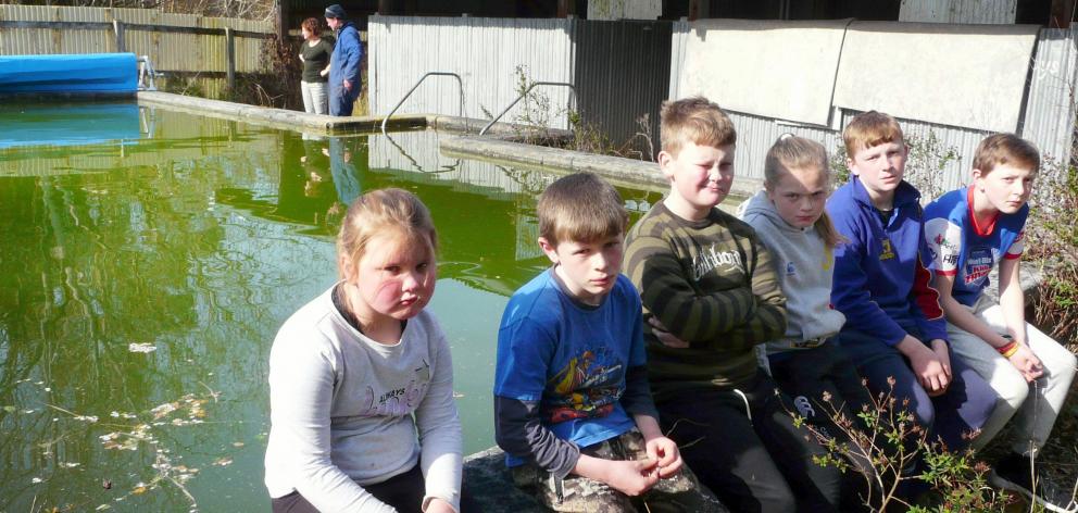 Tahakopa School pupils (from left), Jacquelyn Barrett (7), Clark Napier (9), Liam Barrett (9),...