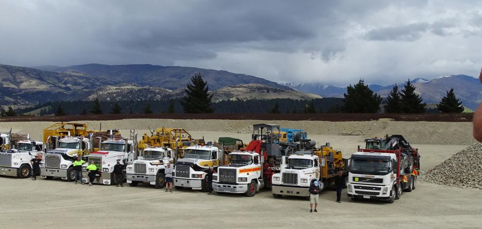 Wheels at Wanaka general manager Allan Dippie takes a photo of the drivers and the 12 trucks...