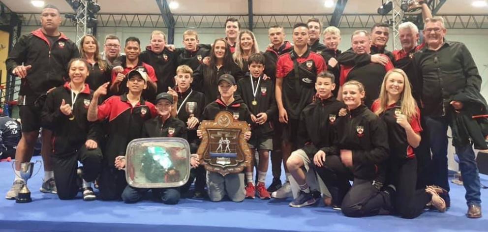 The Canterbury boxing team show off their medals and silverware after a successful nationals. Photo: Canterbury Boxing Association