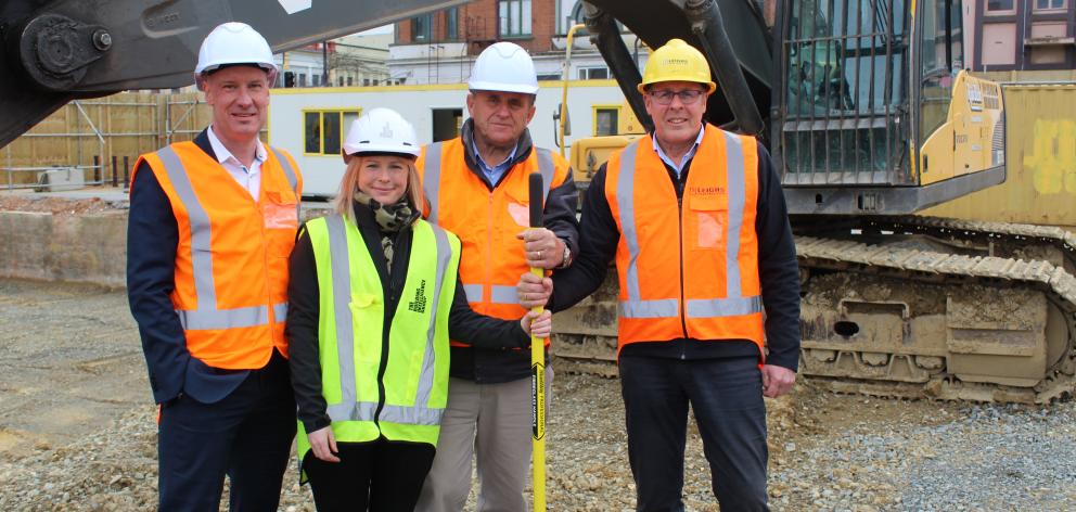 Standing on The Langlands Hotel site are (from left) Invercargill Licensing Trust chief executive...