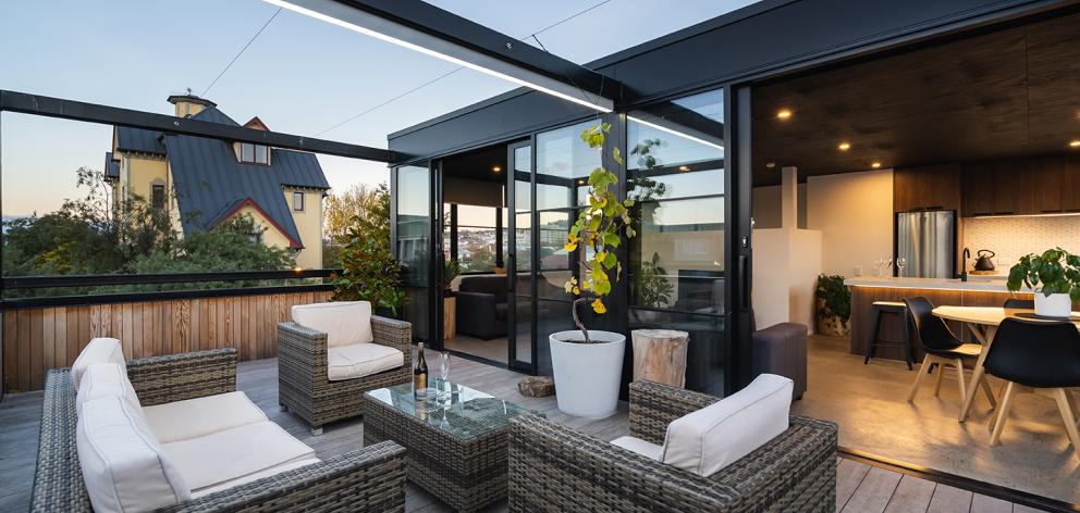 The outdoor area of an apartment in the building.