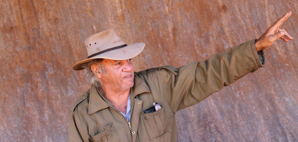 Traditional owner Vincent Forrester guiding around the base of Uluru. Photo: Kerrie Waterworth Traditional owner Vincent Forrester guiding around the base of Uluru. Photo: Kerrie Waterworth
