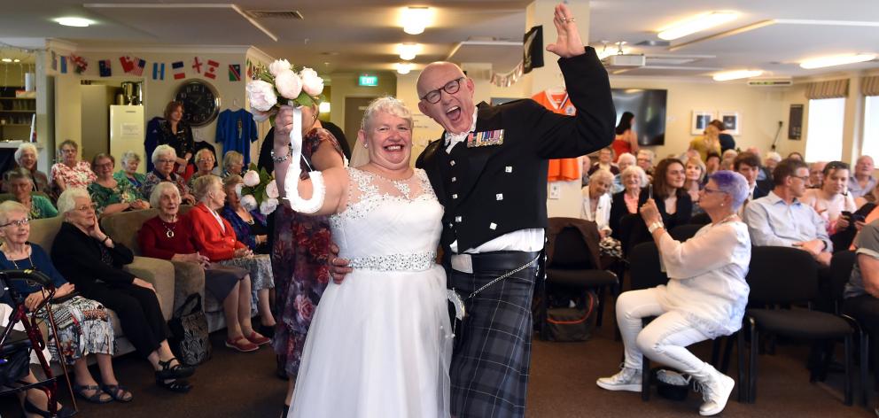Anita and Neil Stockhall cannot contain their happiness after their wedding at a retirement...