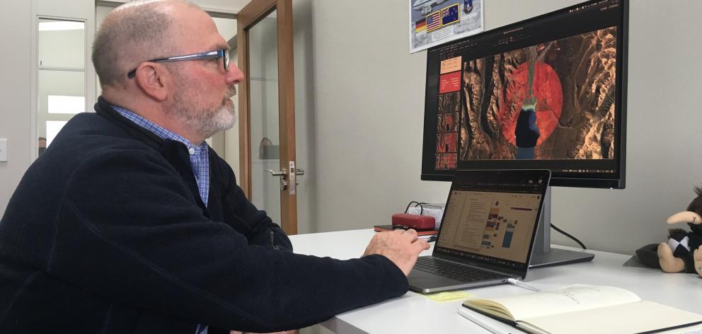 Xerra chief executive Steve Cotter takes a conference call. PHOTO: ADAM BURNS