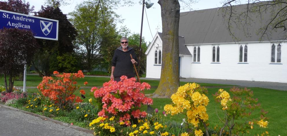 Volunteer gardener Cyril Keen at St Andrew's Church.