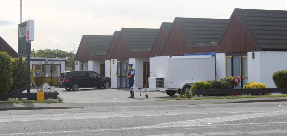 Police guard the scene at the Bavarian Motel after the body was found. PHOTO: ABBEY PALMER
