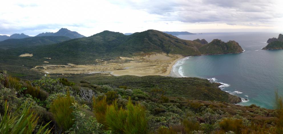 East Ruggedy Beach, Rugged Islands and, in the distance, the Ruggedy Range on the West Coast of...