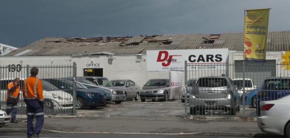 Asbestos removal workers were at DJ Auto in Sydenham on Tuesday morning. Photo: RNZ, Simon Rogers
