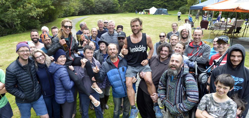 Cargill Crusher winners Sharon Lequeux and Adam Keen are held aloft at the end of the 24-hour...