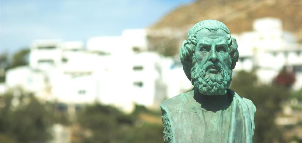 A harbourside bust of Homer in the Greek holiday island of Ios.