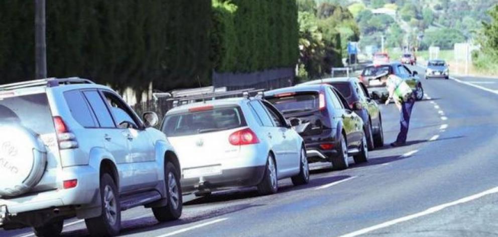 Police talk to motorists after a fatal accident in Hawke's Bay. Photo: NZME