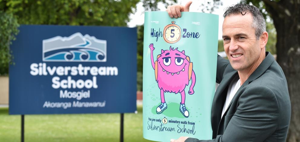 Silverstream School principal Greg Hurley with one of the trial decals which will be printed on...