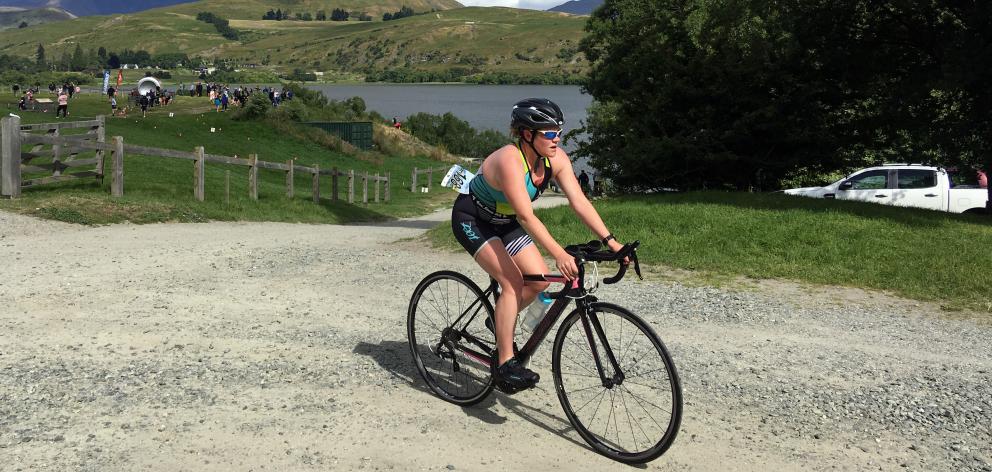 Rachel Armstrong takes part in the Lake Hayes triathlon in Queenstown yesterday. She crossed the...