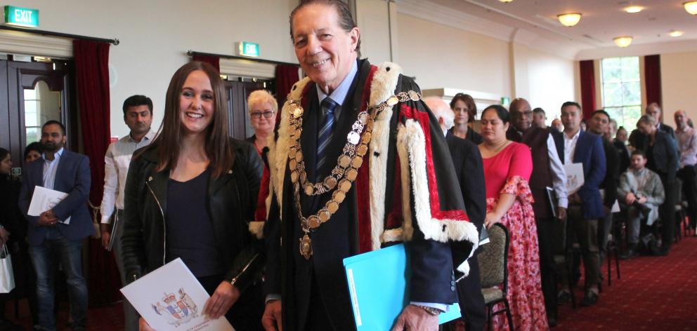 Invercargill reporter Laura Smith received her New Zealand citizenship certificate from Mayor Tim...