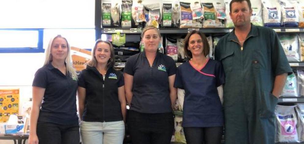 Rebecca and Dan Fleming (second from right and far right ) and their team at Vetcare Kaikoura. Photo: Supplied