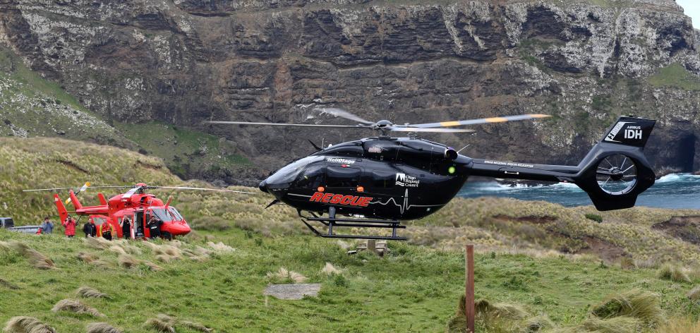 Otago Rescue helicopters at the scene of an incident at Cape Saunders today. Photo: Stephen...