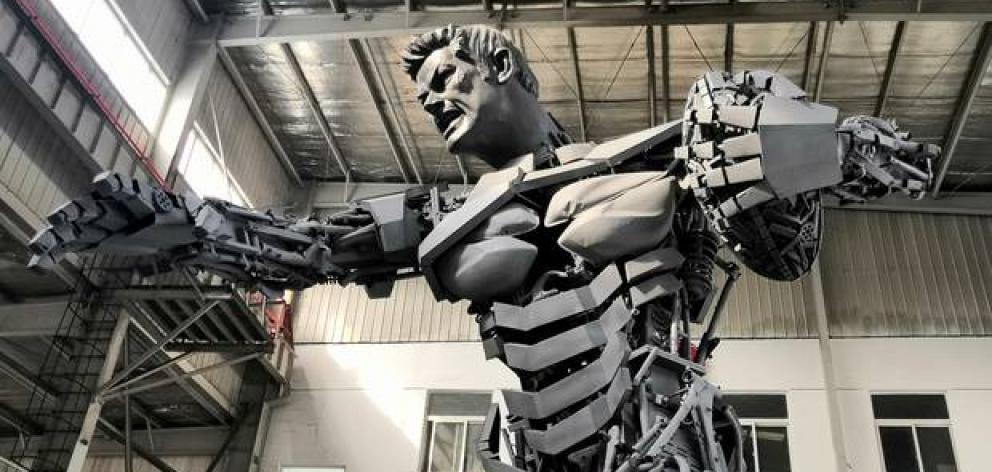 The sculpture shows a man in the image of former All Black captain Richie McCaw and cost about ...