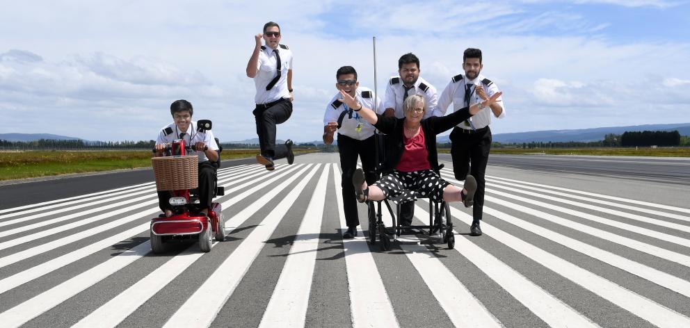 Ready to run the runway this February are (from left, clockwise) trainee pilots Krish Shah, Chris...