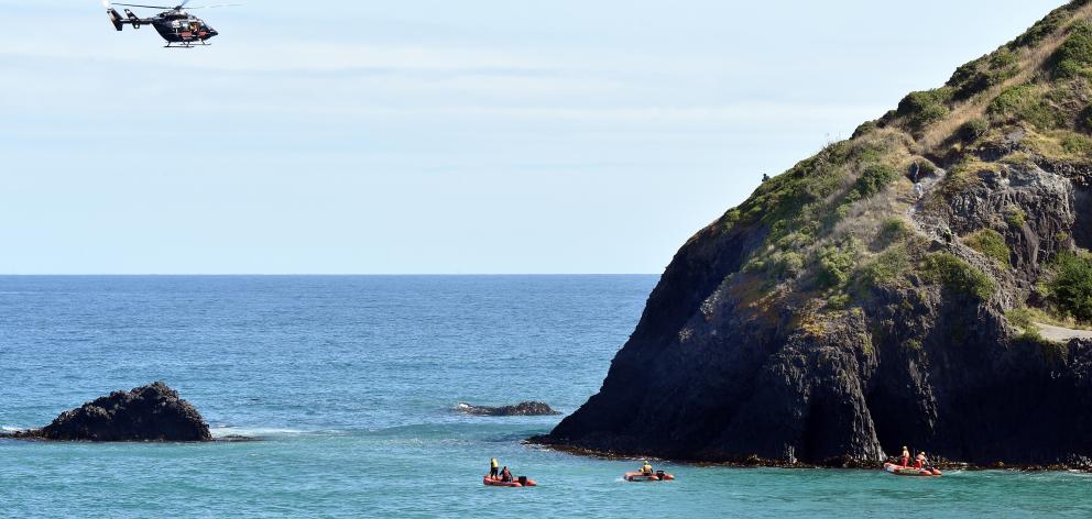 Emergency services search for a person missing in the water by Second Beach, near St Clair, in...