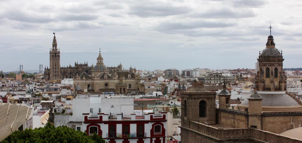 The Seville cityscape from the Metropol Parasol looking towards the magnificent Cathedral Giralda...