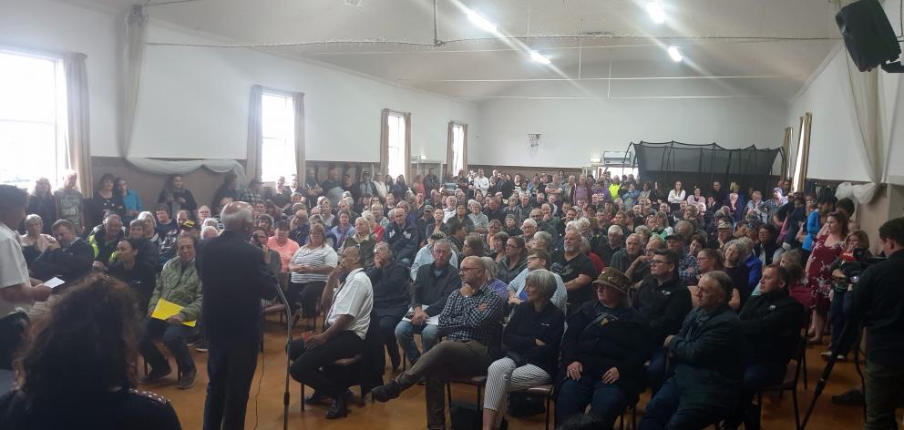 Gore Mayor Tracy Hicks talks to the 400-strong crowd at the Mataura Youth Trust Hall last night....