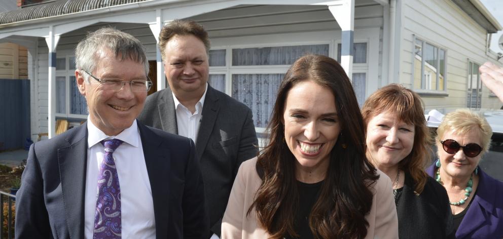 Rino Tirikatene looks on from the back as colleagues David Parker, Jacinda Ardern, Clare Curran...