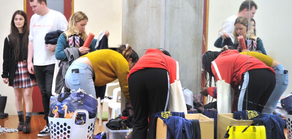 Shoppers look through hundreds of items available at the Otago University Students Association Rummage Sale on Tuesday. Photos: Christine O'Connor