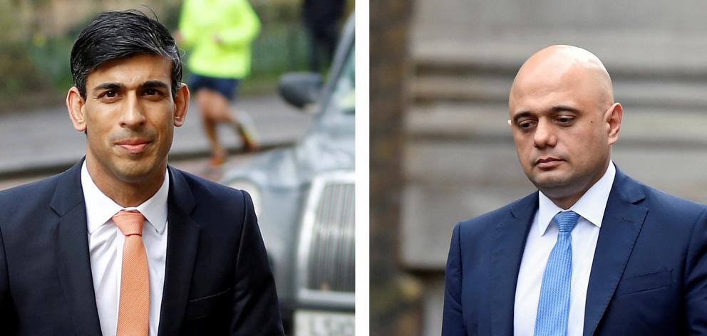Newly appointed Britain's Chancellor of the Exchequer Rishi Sunak (left) replaces Sajid Javid....