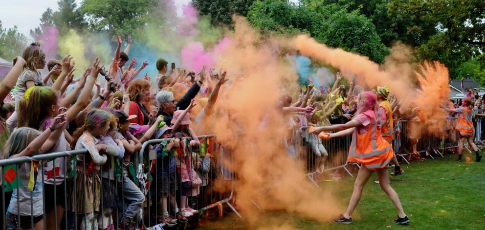 Throwing colour at last year’s Rangiora Festival of Colour in Victoria Park. The popular family day returns to Rangiora again this year, at the same venue, on Sunday, March 29, from 10am to 4pm. Photo: Shelley Topp