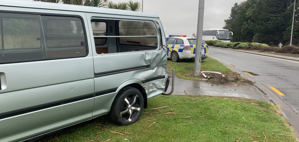 Multiple police vehicles attended the scene of a crash involving a car, truck and pole near the Stead St roundabout in Invercargill yesterday. Photo: Abbey Palmer