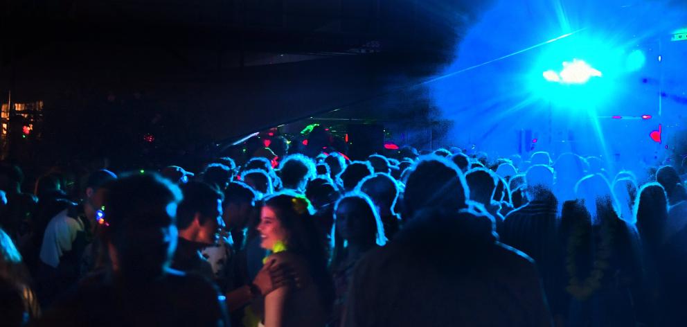 Students dance at a Leith St party on Wednesday night. PHOTO: STEPHEN JAQUIERY