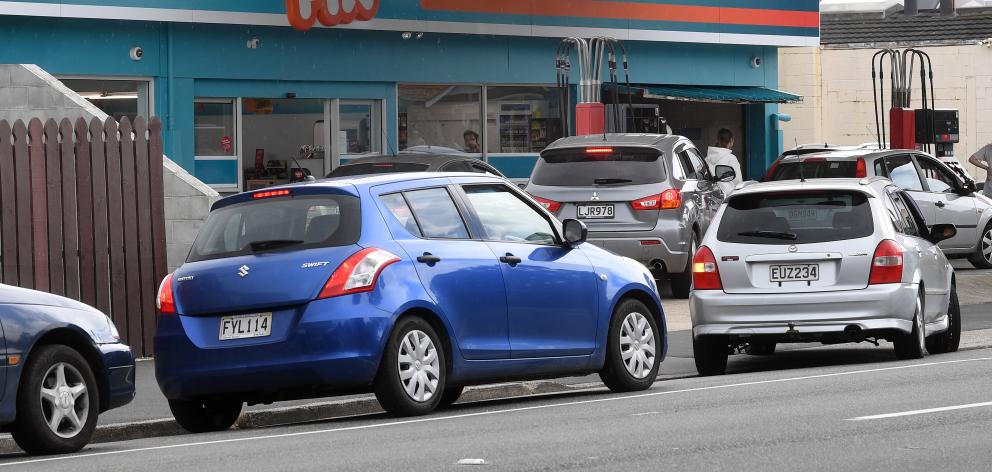 Dunedinites rushed to stores and petrol stations yesterday following the government's plea to not...