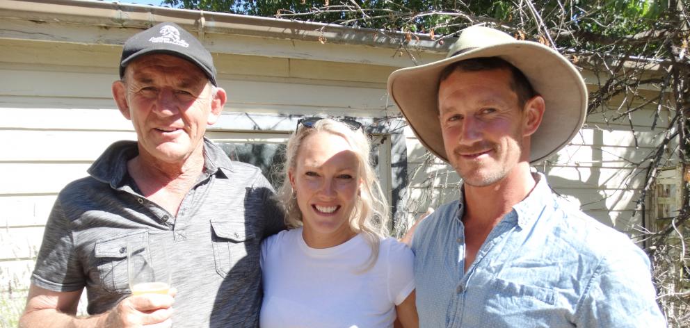 Former All Black Ken Stewart with son Hamish and new daughter-in-law Courtney Stewart, nee Smith,...