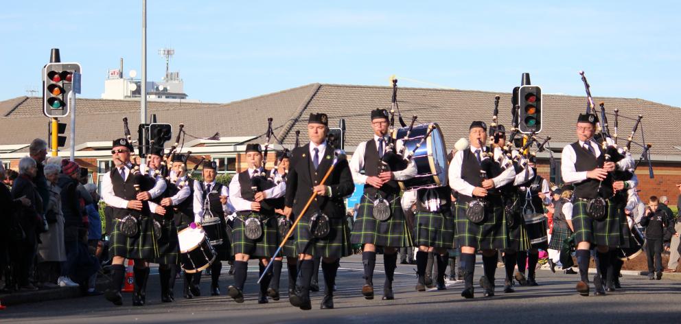 The City of Dunedin Pipe Band competes in the street march.