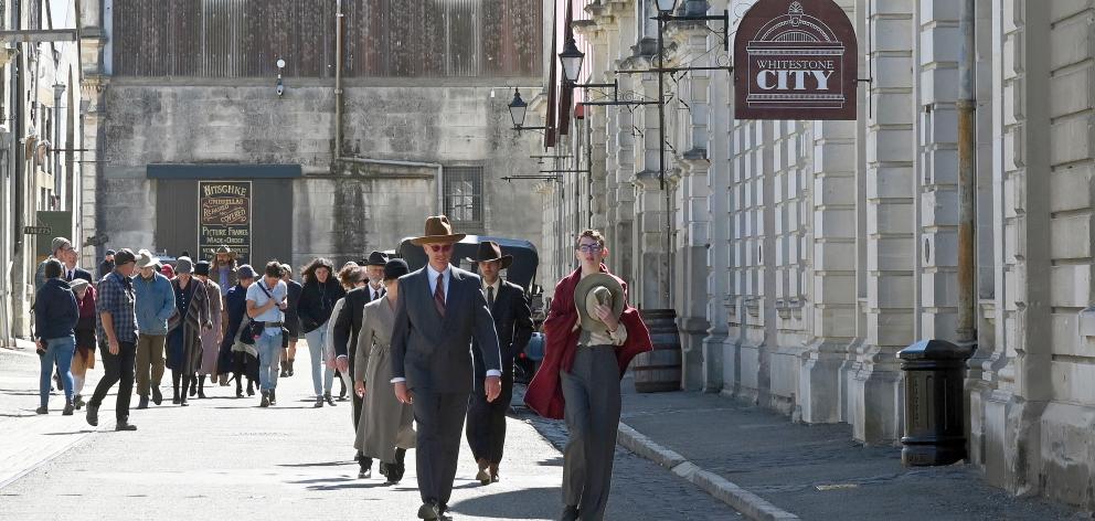 Extras on the Harbour St set yesterday. Photo: Craig Baxter
