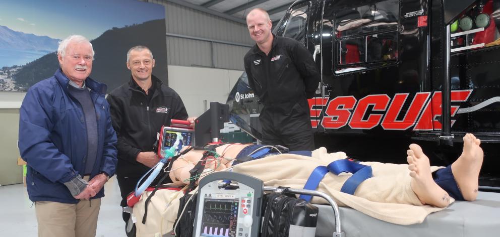 Demonstrating the Queenstown helicopter rescue service’s new automatic CPR machine on a mannequin...