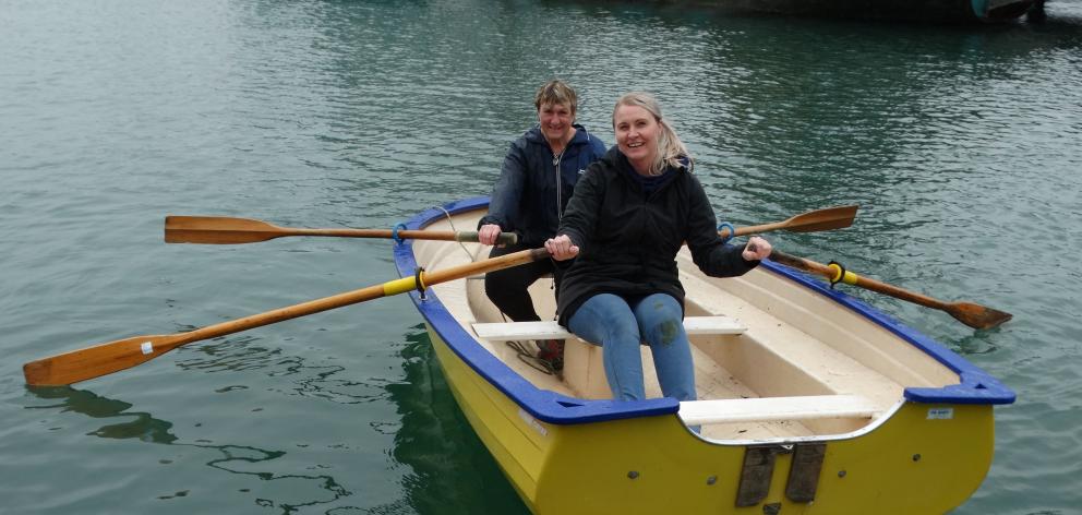 Dinghy rowing competitors RaewynPedofski (left) and Jo Kidston take the opportunity to try out their rowing skills close to the shore at Carey's Bay ahead of next weekend's Carey's Bay Community Regatta Day. PHOTO: BRENDA HARWOOD