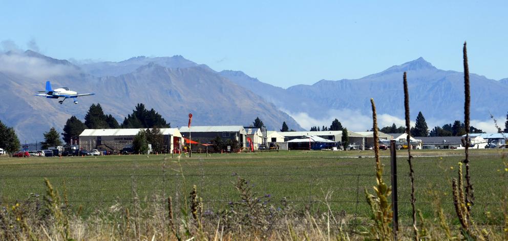 A light aircraft lands at Wanaka airport. PHOTO: STEPHEN JAQUIERY