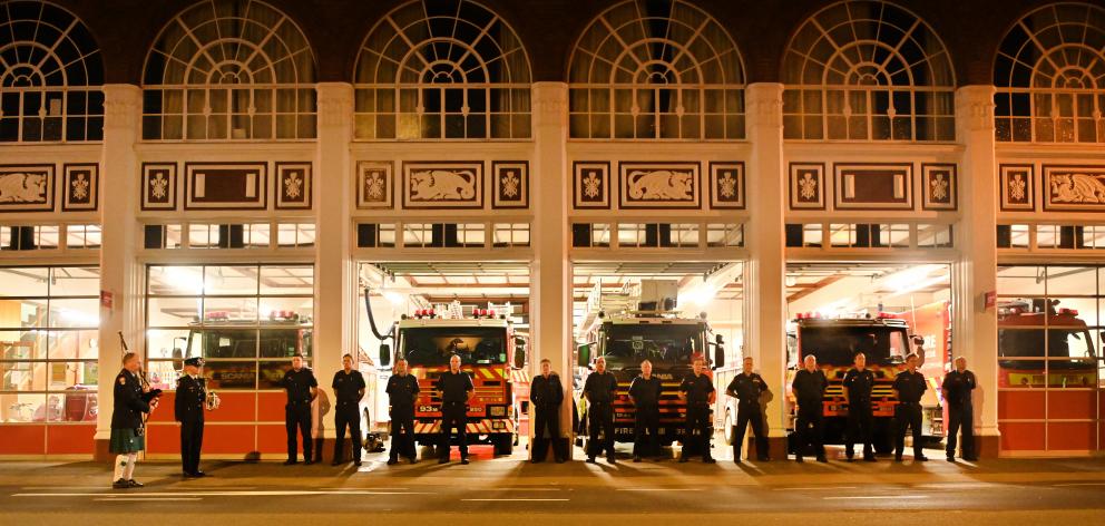 NZ Fire and Emergency crew members gathered outside Dunedin's Central Station to pay tribute this...