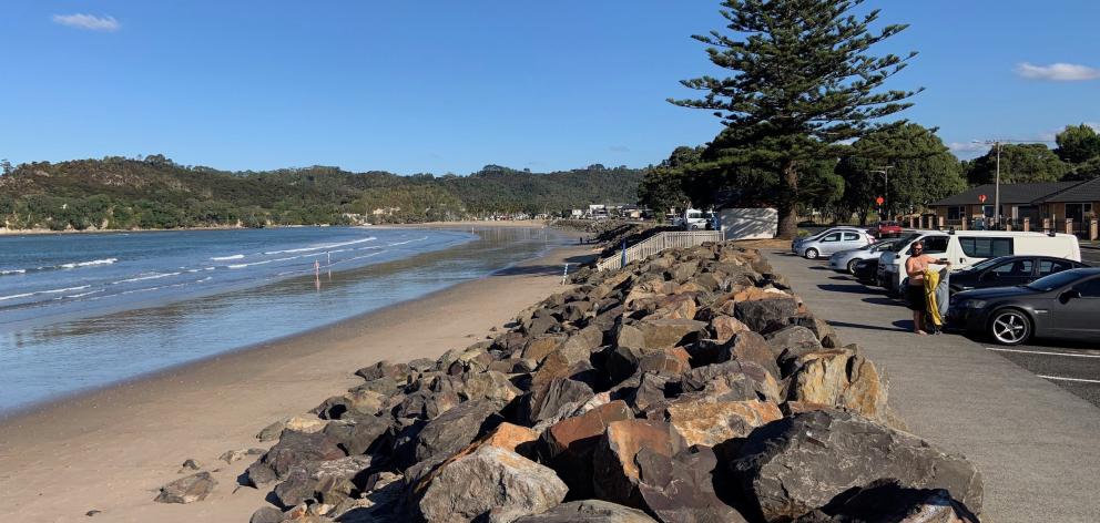 At Whitianga’s Buffalo Beach a rock riprap sea wall guards against coastal erosion and flooding...