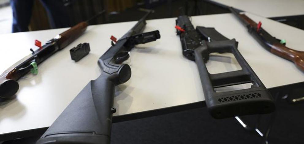 Banned firearms on display at police media conference. Photo: RNZ