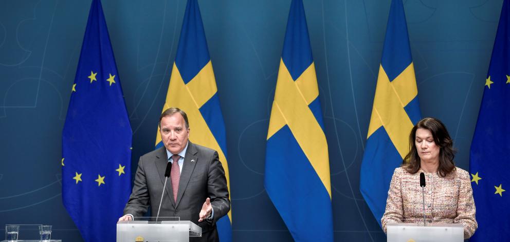 Sweden's Prime Minister Stefan Lofven speaks next to Sweden's Foreign Minister Ann Linde during a news conference on the Covid-19 outbreak. Photo: Reuters