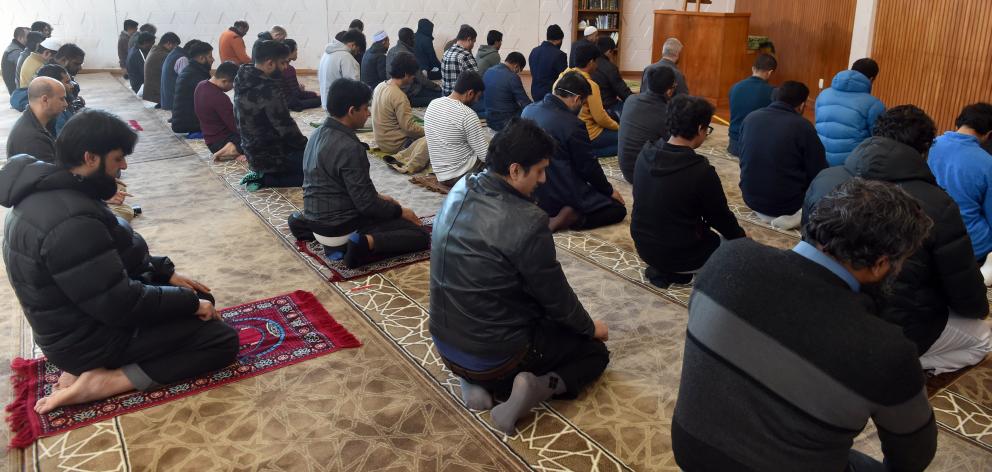 Members of Dunedin’s Muslim community gather for Friday prayers at the Al Huda mosque on Clyde St...