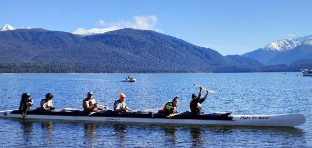 Te Waka Tuhono participants get involved in waka ama to work on being a member of a team. PHOTO:...