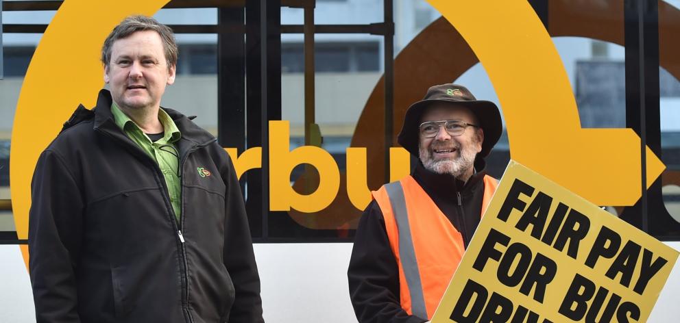 Tramways Union members Raymond Tonkin (left) and Peter Dowden at the bus hub in Great King St, in...
