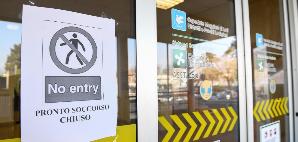 A 'no entry' sign advising that the emergency room is closed is seen on the main entrance of the Codogno hospital amid a coronavirus outbreak in northern Italy. Photo: Reuters